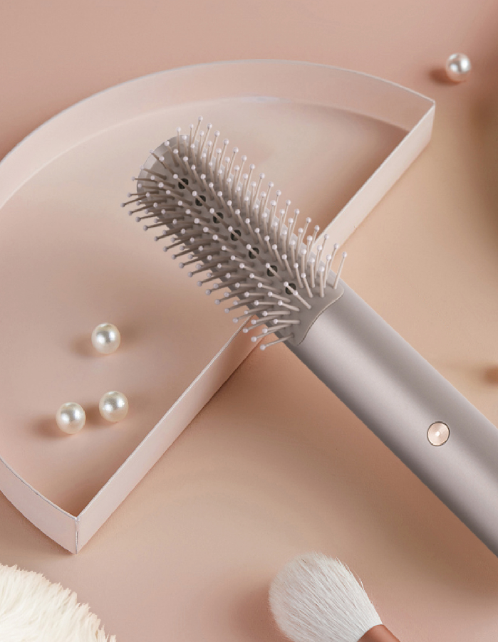 Cepillo alisador con calor